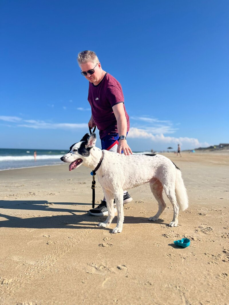 James and his dog Domino on the North Carolina coast